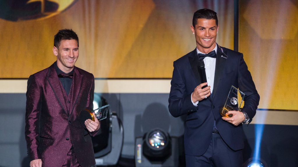 FIFA Ballon d'Or nominees Lionel Messi of Argentina and FC Barcelona (L) and Cristiano Ronaldo of Portugal and Real Madrid smile during the FIFA Ballon d'Or Gala 2014