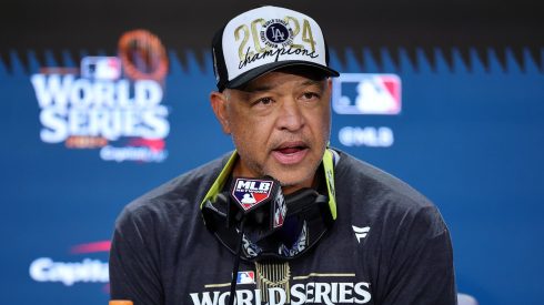 Manager Dave Roberts #30 of the Los Angeles Dodgers talks to the media after the Dodgers defeated the New York Yankees 7-6 in game 5 to win the 2024 World Series at Yankee Stadium on October 30, 2024 in the Bronx borough of New York City.