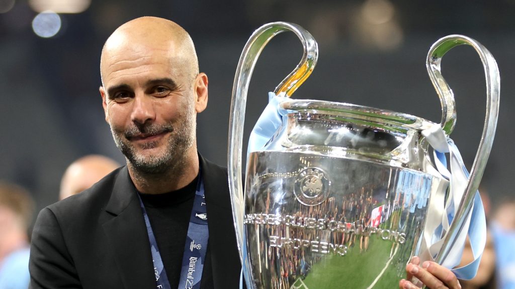 Pep Guardiola, Manager of Manchester City, celebrates with the UEFA Champions League trophy after the team's victory during the UEFA Champions League 2022/23 final match between FC Internazionale and Manchester City FC at Ataturk Olympic Stadium on June 10, 2023 in Istanbul, Turkey.
